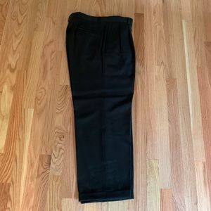 Used Men’s dress pants 100% wool black size 36. Cuffed